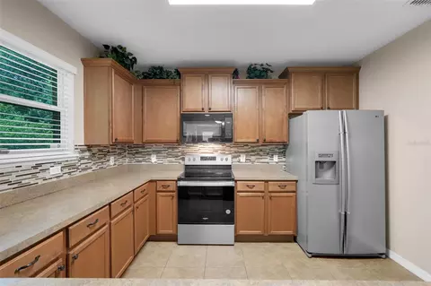 Kitchen - 221 Daigledog St, Saint Cloud, FL 34772 photo 4 of 4
