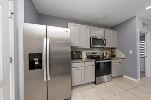 Kitchen - 2822 Harmonia Hammock Rd, Harmony, FL 34773 photo 2 of 2