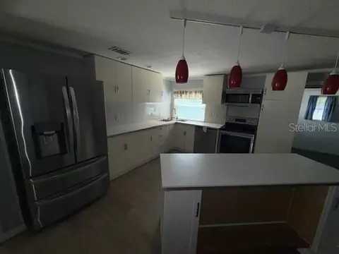 Kitchen - 6785 NE 5th St, Ocala, FL 34470 photo 1 of 2