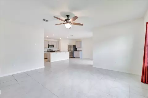 Living - 6766 Grace Hammock Rd, Saint Cloud, FL 34773 photo 2 of 3