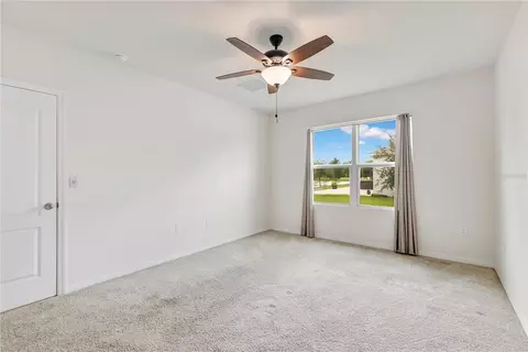 Bedroom - 6766 Grace Hammock Rd, Saint Cloud, FL 34773 photo 2 of 9