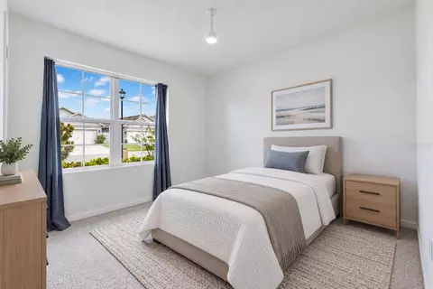 Bedroom - 6766 Grace Hammock Rd, Saint Cloud, FL 34773 photo 8 of 9