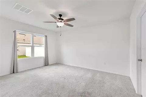 Bedroom - 6766 Grace Hammock Rd, Saint Cloud, FL 34773 photo 3 of 9
