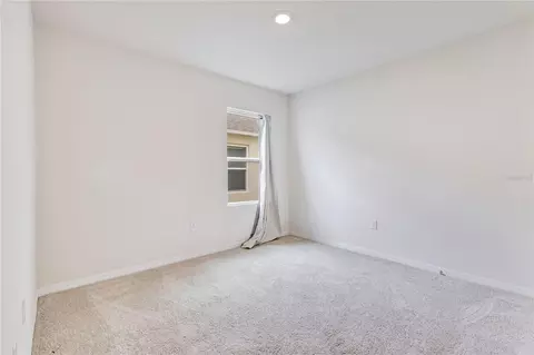 Bedroom - 6766 Grace Hammock Rd, Saint Cloud, FL 34773 photo 7 of 9