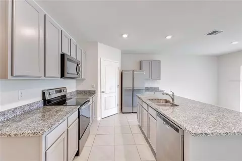 Kitchen - 6766 Grace Hammock Rd, Saint Cloud, FL 34773 photo 3 of 4