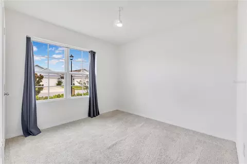 Bedroom - 6766 Grace Hammock Rd, Saint Cloud, FL 34773 photo 9 of 9