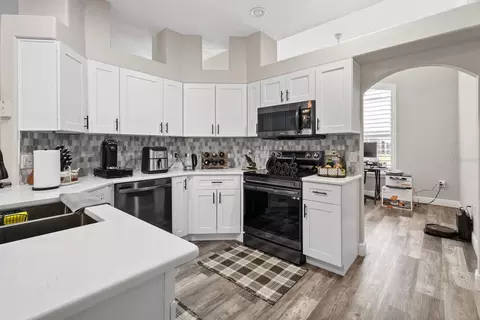Kitchen - 5686 Merlin Way, Saint Cloud, FL 34772 photo 3 of 9