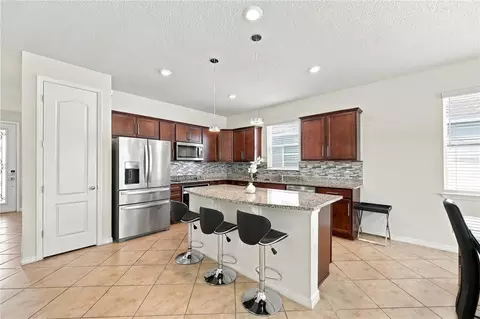 Kitchen - 5133 Chickadee St, Saint Cloud, FL 34771 photo 3 of 4