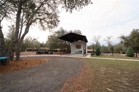 Exterior - 7670 NE 97th Ct, Bronson, FL 32621 photo 3 of 12