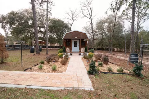 Exterior - 7670 NE 97th Ct, Bronson, FL 32621 photo 7 of 12