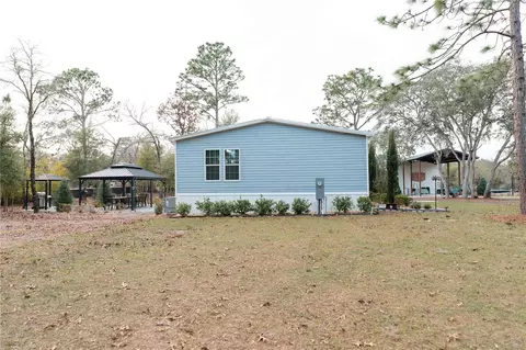 Exterior - 7670 NE 97th Ct, Bronson, FL 32621 photo 2 of 12