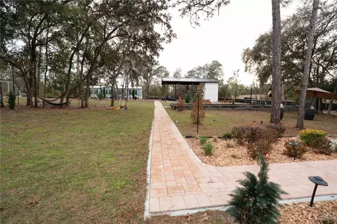 Exterior - 7670 NE 97th Ct, Bronson, FL 32621 photo 6 of 12