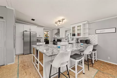 Kitchen - 9445 Helena Dr, Saint Cloud, FL 34773 photo 1 of 5