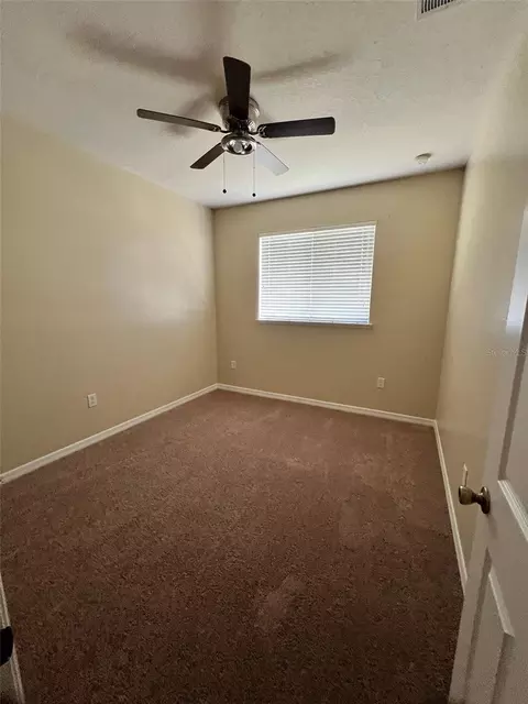 Bedroom - 2202 Seven Oaks Dr, Saint Cloud, FL 34772 photo 5 of 5