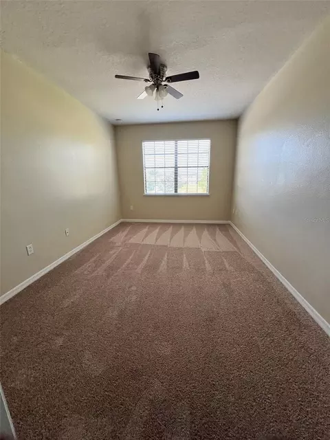 Bedroom - 2202 Seven Oaks Dr, Saint Cloud, FL 34772 photo 2 of 5