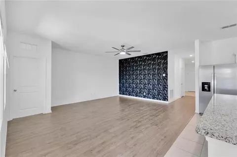 Living - 5860 Beefmaster Rd, Saint Cloud, FL 34771 photo 3 of 4