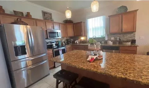 Kitchen - 3606 Charmed Ln, Saint Cloud, FL 34772 photo 2 of 3