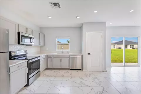 Kitchen - 720 Taurus Ln, Saint Cloud, FL 34772 photo 2 of 2