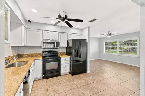 Kitchen - 1215 Lakeshore Blvd, Saint Cloud, FL 34769 photo 2 of 3