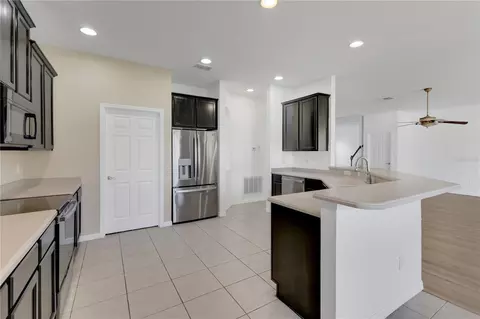 Kitchen - 2400 Tybee Rd, Saint Cloud, FL 34769 photo 1 of 3