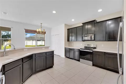 Kitchen - 2400 Tybee Rd, Saint Cloud, FL 34769 photo 2 of 3