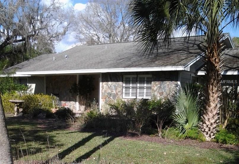  977 Woodgate Dr, Palm Harbor, FL 34685 photo 1