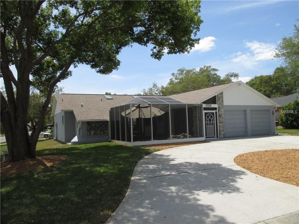 7398 Flyway Dr, Spring Hill, FL 34607 photo 1