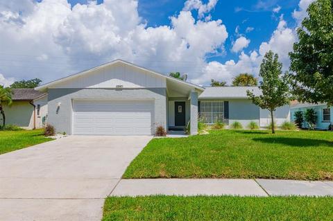 1287 Dinnerbell Ln E, Dunedin, FL 34698 photo 1