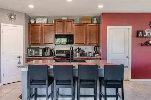 Kitchen - 409 Serenity Mill Loop, Ruskin, FL 33570 photo 2 of 4