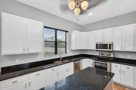 Kitchen - 3870 155th Ave E, Parrish, FL 34219 photo 4 of 5