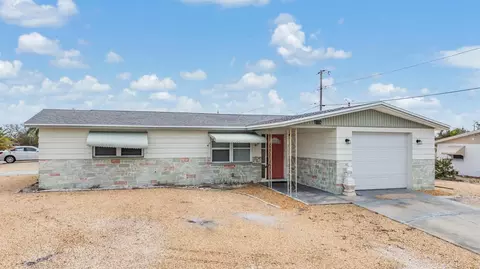 1118 Excalibur St, Holiday, FL 34690