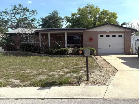 3302 Eisenhower Dr, Holiday, FL 34691