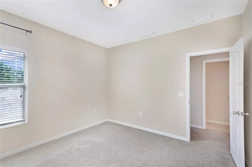Bedroom - 7410 S Fitzgerald St, Tampa, FL 33616 photo 12 of 13