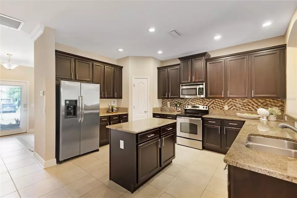 Kitchen - 7410 S Fitzgerald St, Tampa, FL 33616 photo 2 of 3
