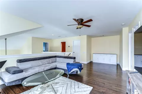 Living - 3292 Covered Bridge Dr E, Dunedin, FL 34698 photo 2 of 3