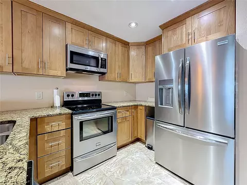 Kitchen - 230 Medallion Blvd #G, Madeira Beach, FL 33708 photo 2 of 4