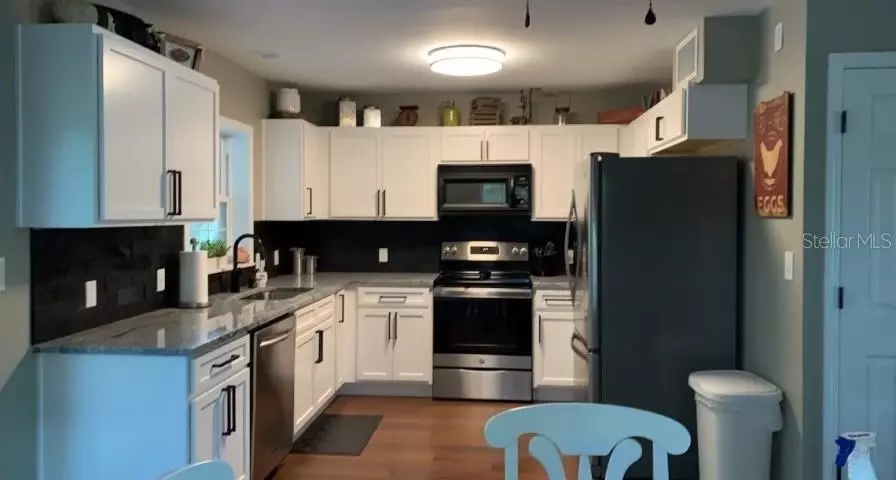 Kitchen - 7152 Sandy Ln, Wesley Chapel, FL 33544 photo 2 of 3