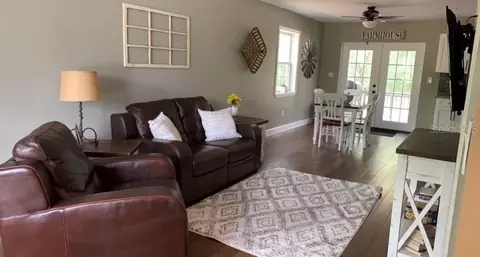 Living - 7152 Sandy Ln, Wesley Chapel, FL 33544 photo 1 of 1