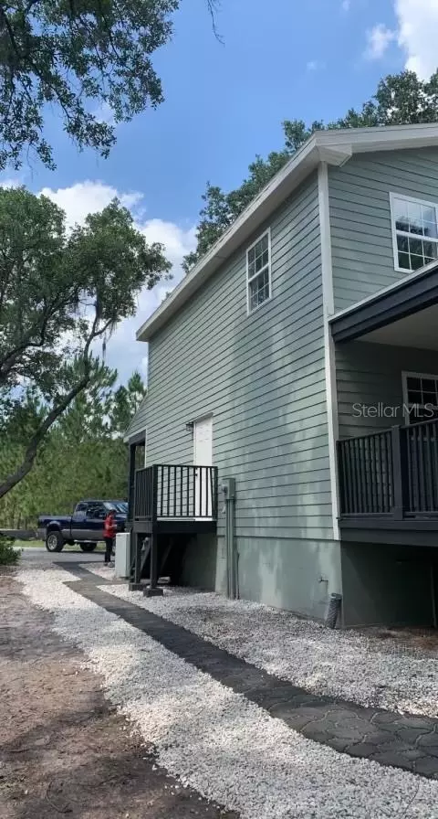 Exterior - 7152 Sandy Ln, Wesley Chapel, FL 33544 photo 5 of 8