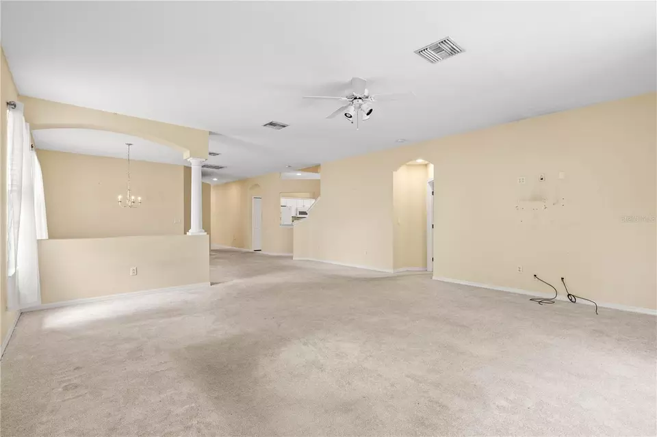 Living - 27353 Edenfield Dr, Wesley Chapel, FL 33544 photo 2 of 4