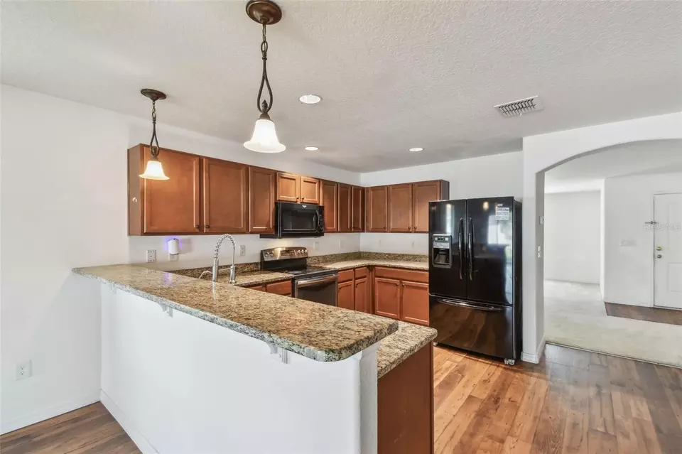 Kitchen - 11837 Thicket Wood Dr, Riverview, FL 33579 photo 3 of 4