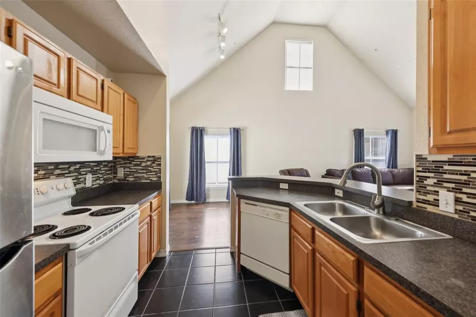 Kitchen - 6017 Westgate Dr #924, Orlando, FL 32835 photo 3 of 3