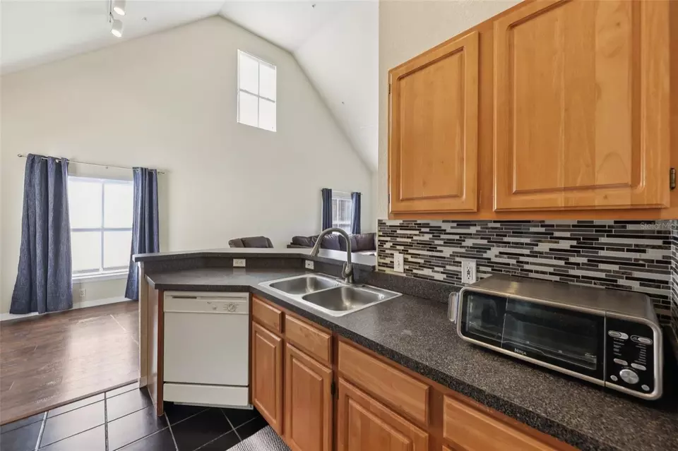 Kitchen - 6017 Westgate Dr #924, Orlando, FL 32835 photo 2 of 3