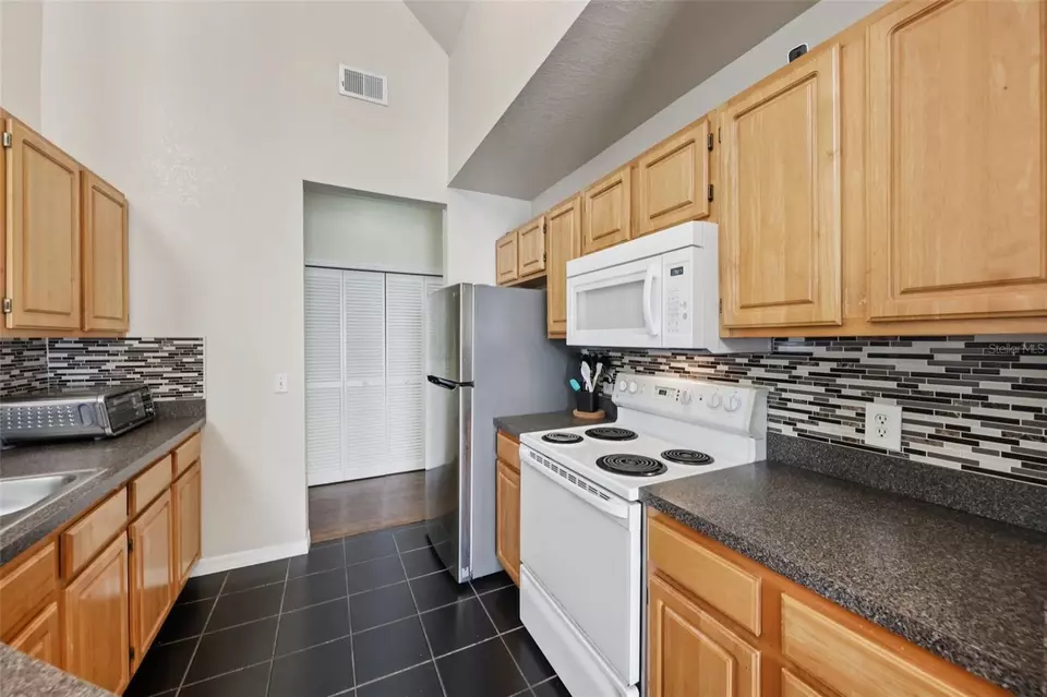 Kitchen - 6017 Westgate Dr #924, Orlando, FL 32835 photo 1 of 3