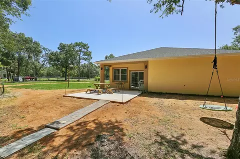 Exterior - 33433 Loop Ct, Webster, FL 33597 photo 3 of 13