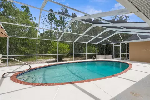 Exterior - 17131 Dalberg Dr, Spring Hill, FL 34610 photo 5 of 12