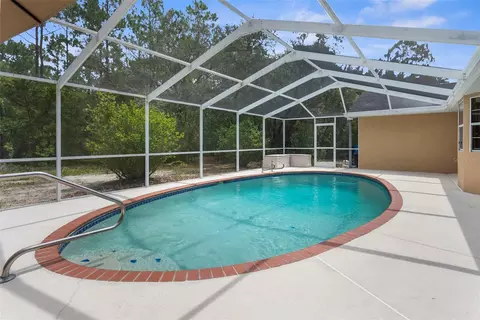 Exterior - 17131 Dalberg Dr, Spring Hill, FL 34610 photo 6 of 12