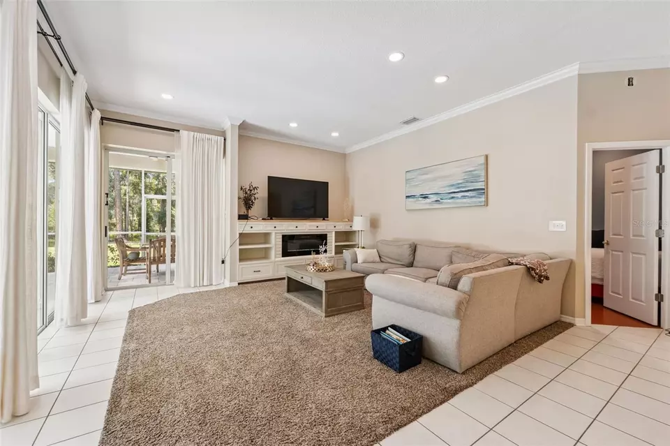 Living - 27641 Lincoln Pl, Wesley Chapel, FL 33544 photo 2 of 8