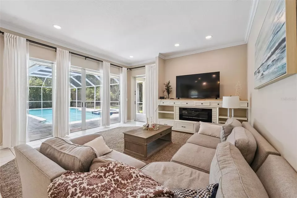 Living - 27641 Lincoln Pl, Wesley Chapel, FL 33544 photo 3 of 8