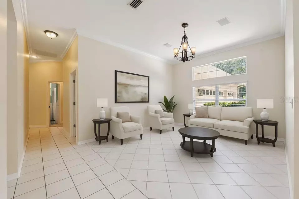 Living - 27641 Lincoln Pl, Wesley Chapel, FL 33544 photo 1 of 8